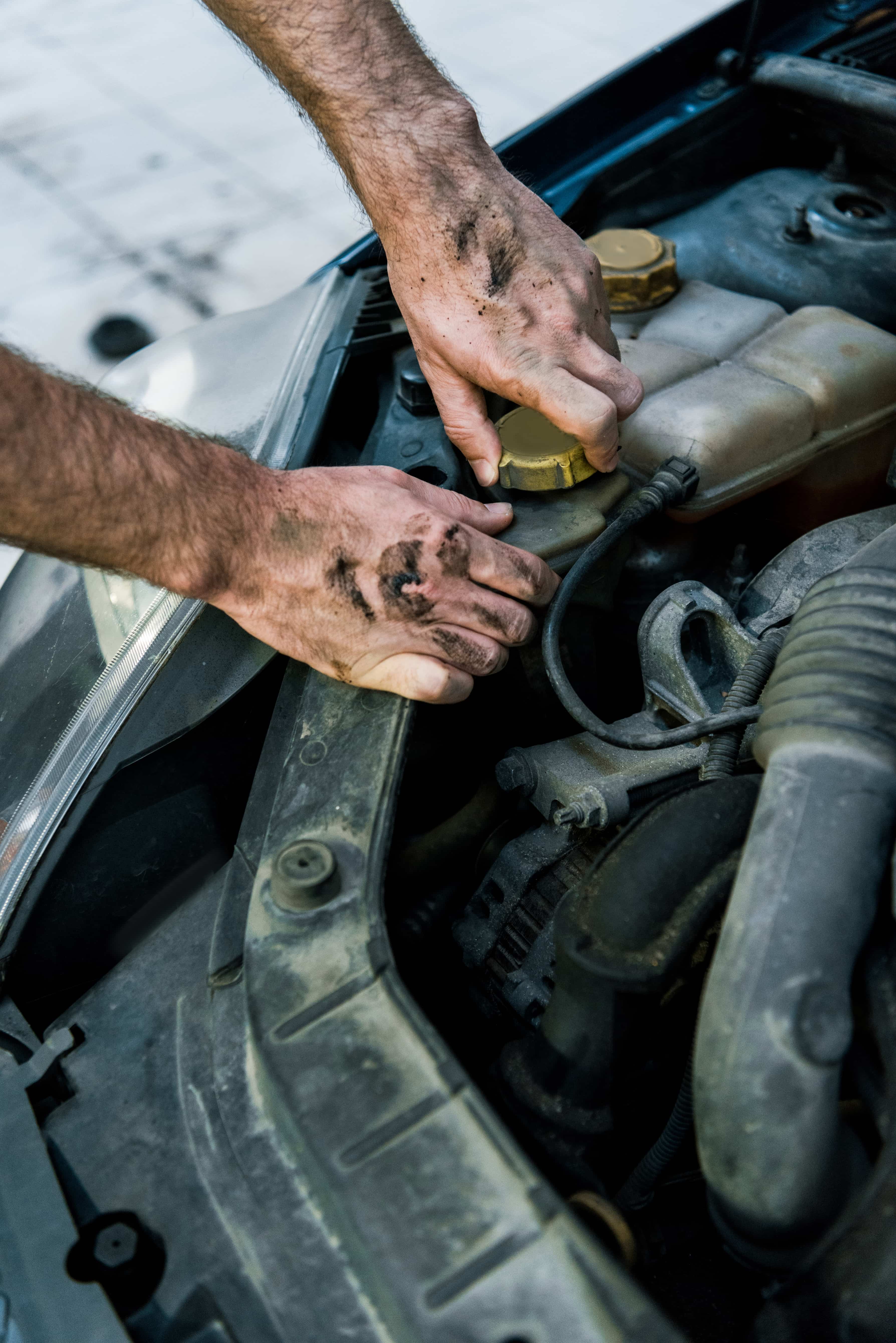 Mobile automotive technician servicing a vehicle in the East Bay